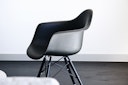 Modern black chair in minimalist room